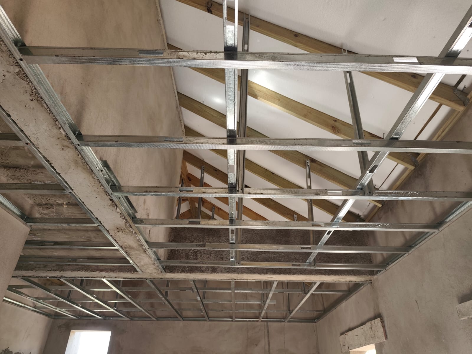 Interior trusses and scaffold during framing stage