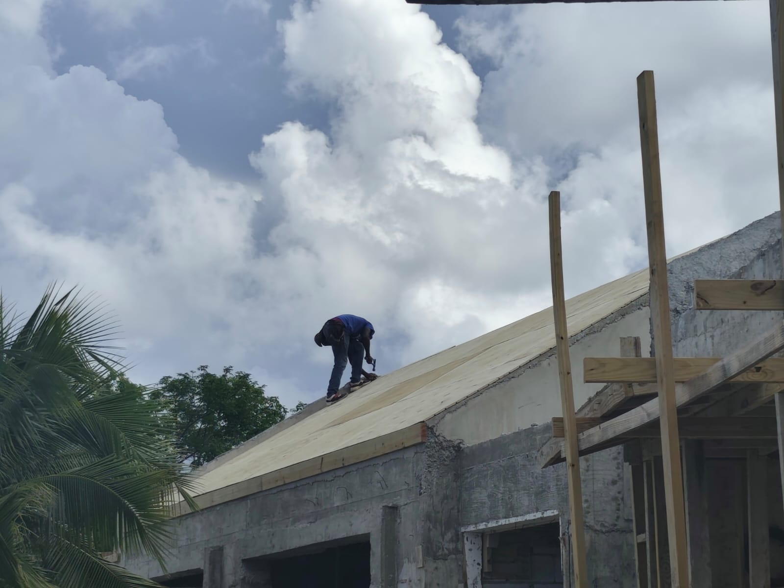 Worker on roof during installation